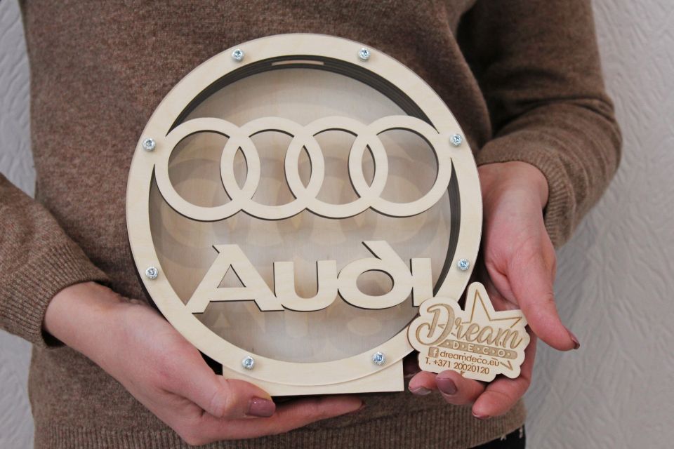 Krājkase apaļa ar AUDI automašīnas logotipu
