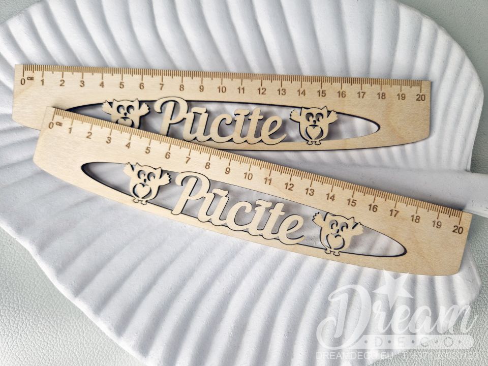 Линейки с названием группы "Pūcīte" и совятами